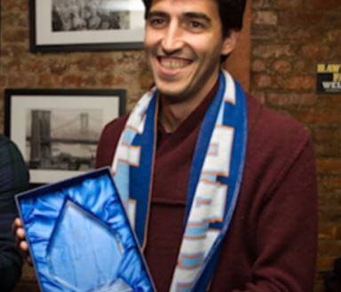 Andoni Iraola with unsung hero award in 2016.